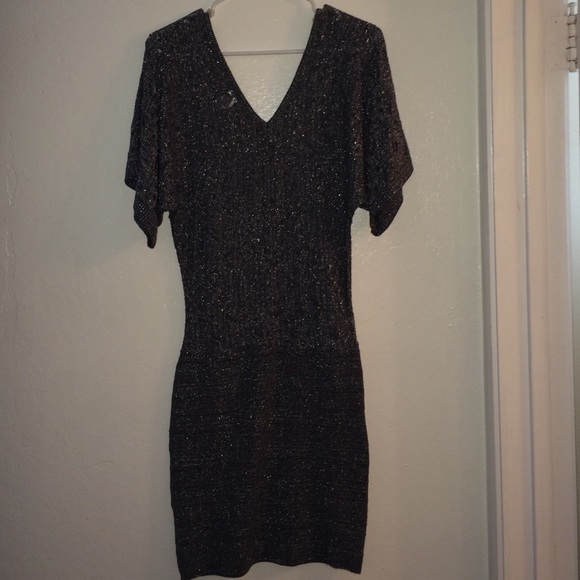 Grey batwing blouse attached to stretch skirt