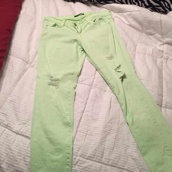 Mint green ripped jeans