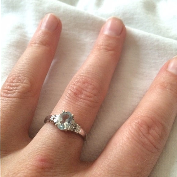 Blue topaz and diamond white gold ring