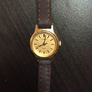 Gold watch with faux leather strap