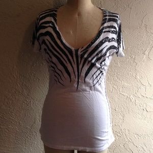 White vneck shirt with zebra