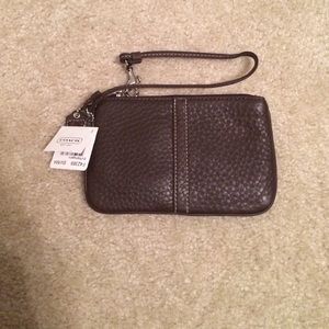 Coach brown wristlet