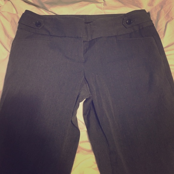 Boot cut grey pants.