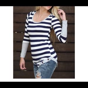 Adorable navy and great striped top. Button detail