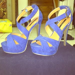 Blue suede pumps.