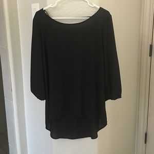 Perfect solid top with open back detail!