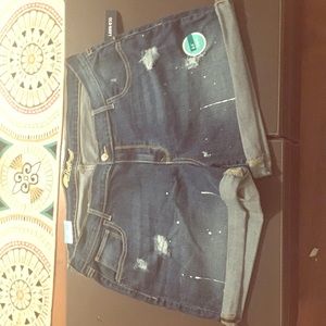 Dark wash paint splattered boyfriend shorts