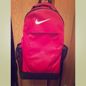 Red Nike backpack.