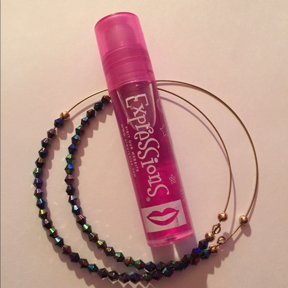 two bracelets and cherry lipgloss