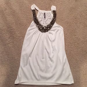 Cream tank with brad embellishment