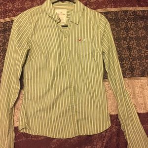 Green striped button up blouse.