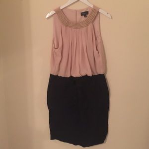 Modern tan/black skin tight dress