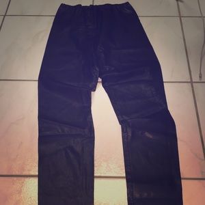 Black faux leather pants.