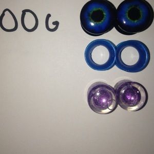 eyeball plugs, blue tunnels, purple glitter plugs