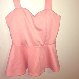 Pearl pink color shirt.