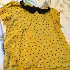 Yellow blouse with black collar