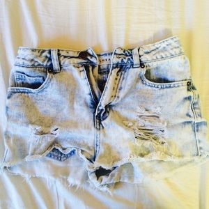 Acid wash cutoff denim shorts