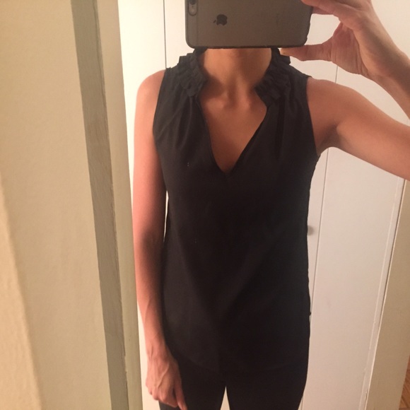 Black silky ruffle neck vneck work top