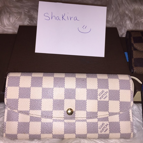 SoldAuthentic Louis Vuitton Emilie wallet