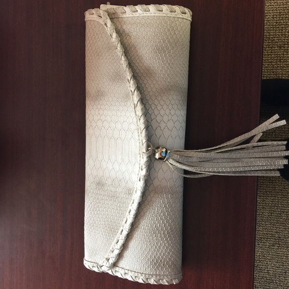 Snakeskin clutch w tassel
