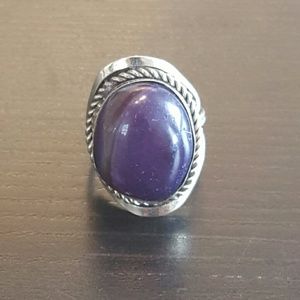 Handmade silver ring with purple stone