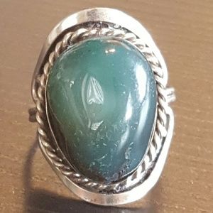 Handmade silver ring with dark green stone