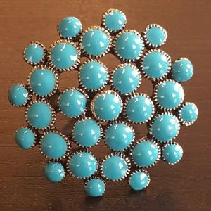 Ring with cluster of turquoise circles