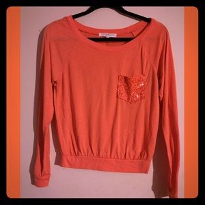 Orange long sleeve shirt