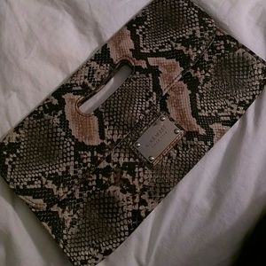 Snake skin clutch