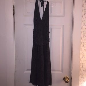 Black halter dress with small white polka dots