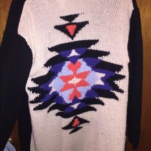 black front with tribal back sweater