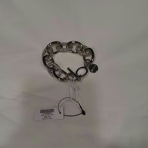 Silver bracelet with clear stones