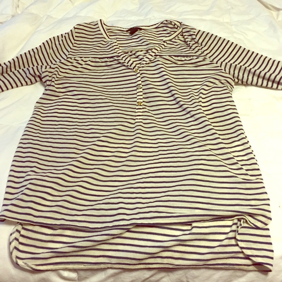 Three quarter length navy and white stripped shirt