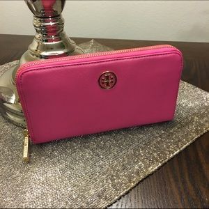 Pink Tory Burch Robinson zip around wallet