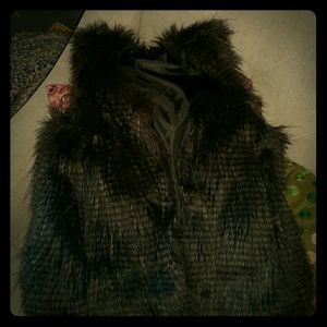 Black faux fur vest