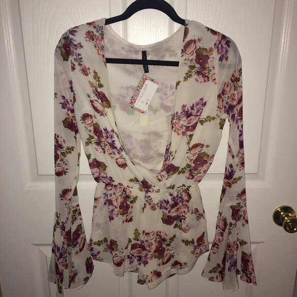 San Joy Dresses & Skirts - Floral Romper San Joy Dresses & Skirts - Floral Romper