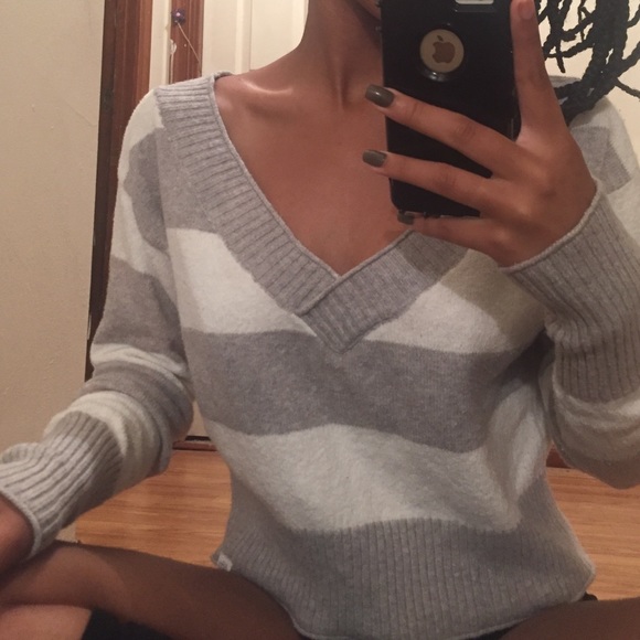 white and grey sweater
