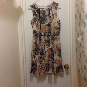 Brown and tan sleeveless summer dress.
