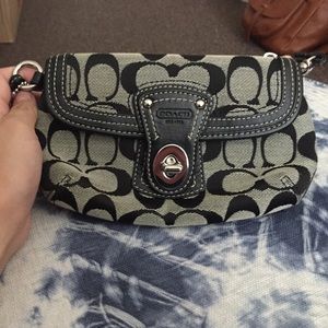 Coach (AUTHENTIC) black monogram wristlet.
