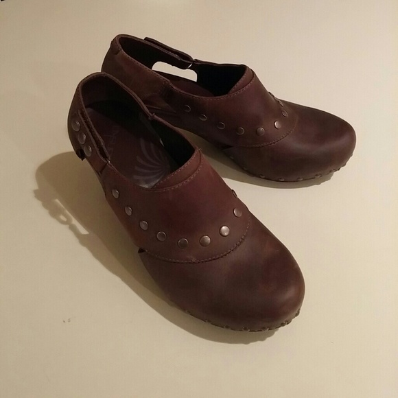 Brown Dansko shoes with Rivets
