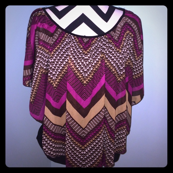 Flowy lined cape top.