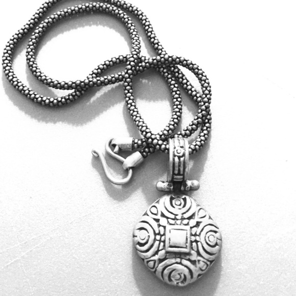 Unique silver necklace with black accent