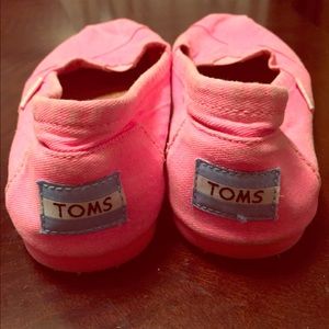 TOMS hot pink slip ons