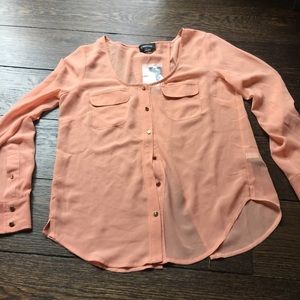 Brand new open back Bebe blouse