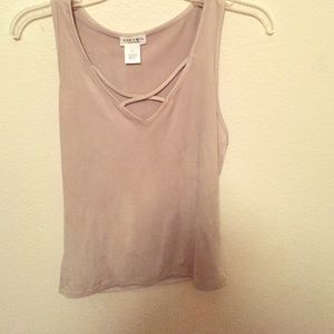 Nude colored top.
