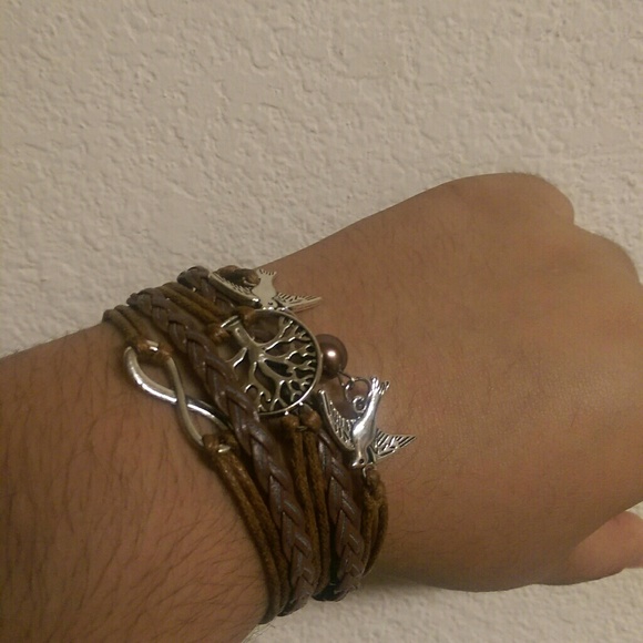 Leather strand bracelet with silver charms!
