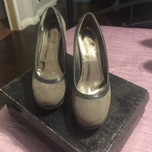 Baby phat snake platform heels. worm a few times.