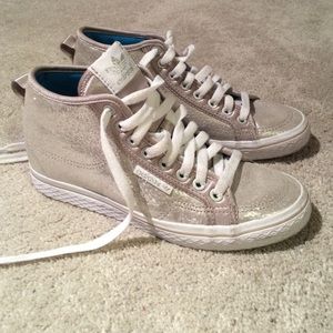 Adidas wedge high tops.