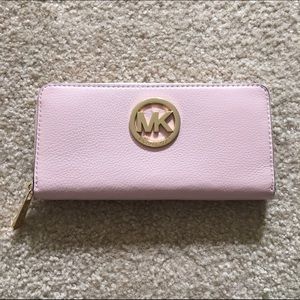 Sold! Michael Kors Fulton zip around wallet pink
