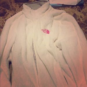 White fuzzy North Face- breast cancer edition